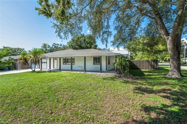 view of front of house featuring a front lawn and a porch