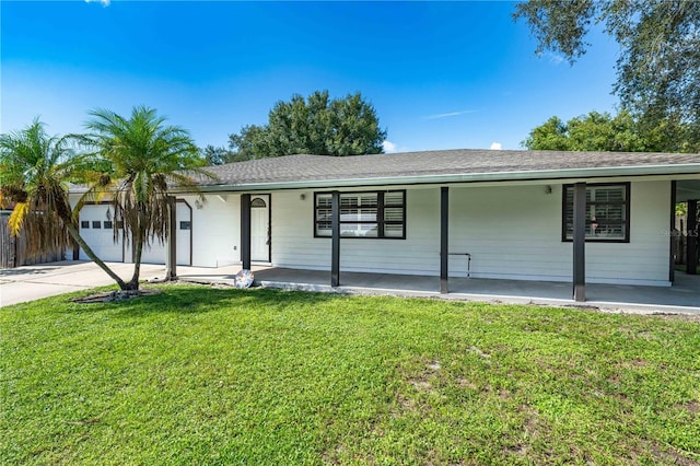 single story home featuring a front yard and a porch