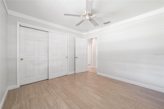 unfurnished bedroom with a closet, ceiling fan, and light hardwood / wood-style floors