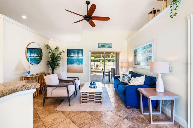 tiled living room featuring ceiling fan and ornamental molding