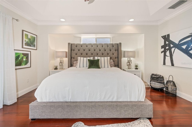 bedroom featuring ornamental molding and dark hardwood / wood-style floors