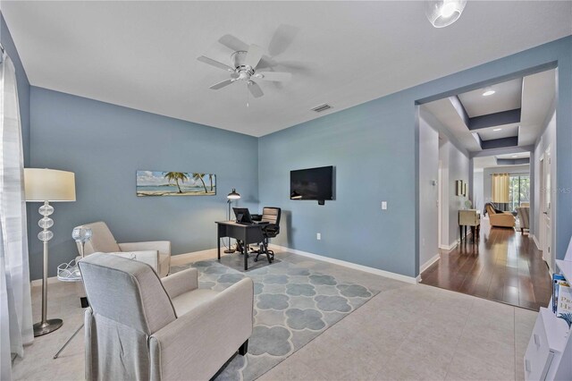 interior space with ceiling fan and hardwood / wood-style flooring