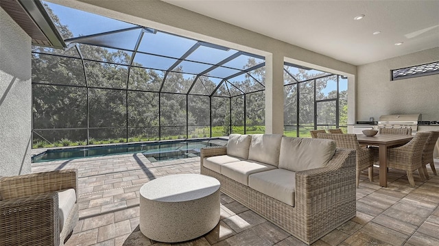 view of patio / terrace featuring an outdoor living space, grilling area, and a lanai