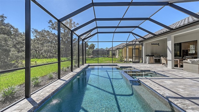 view of pool with glass enclosure, a yard, a patio, and area for grilling