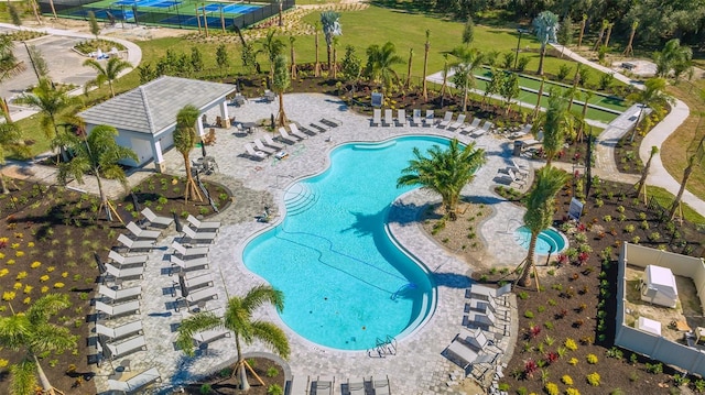 view of swimming pool with a patio