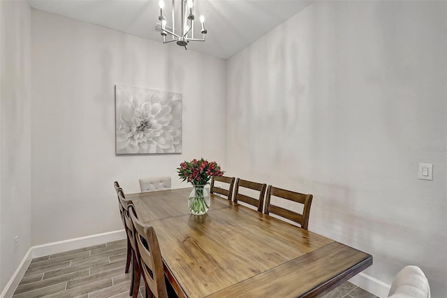 dining area featuring a chandelier and light hardwood / wood-style floors