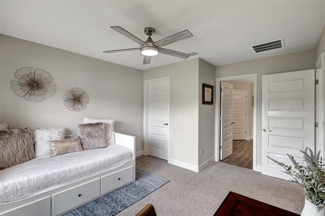 interior space featuring ceiling fan