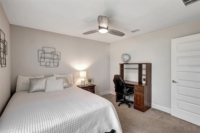 bedroom featuring light colored carpet and ceiling fan