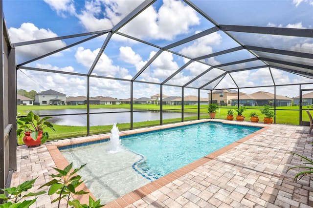 view of pool with a water view, a lawn, a residential view, a lanai, and a patio area