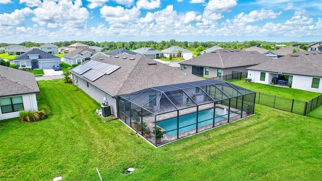 birds eye view of property with a residential view