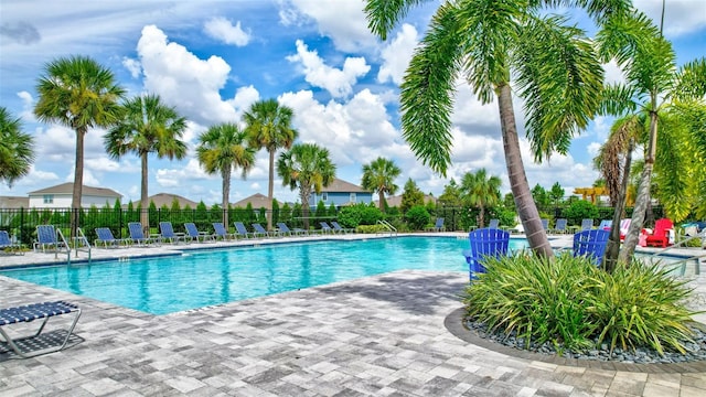 view of pool featuring a patio