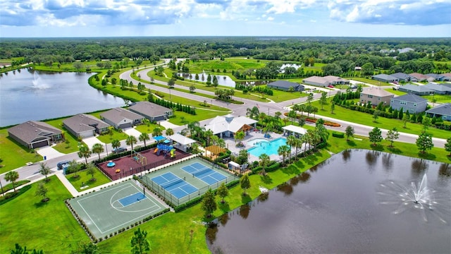 bird's eye view featuring a water view and a residential view