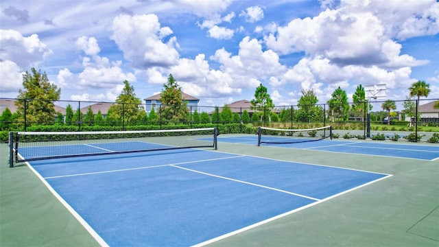 view of sport court featuring community basketball court and fence