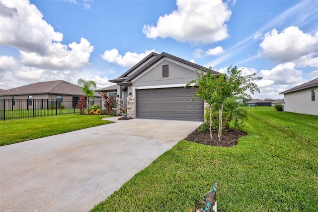 ranch-style house featuring a front lawn, fence, concrete driveway, stucco siding, and a garage