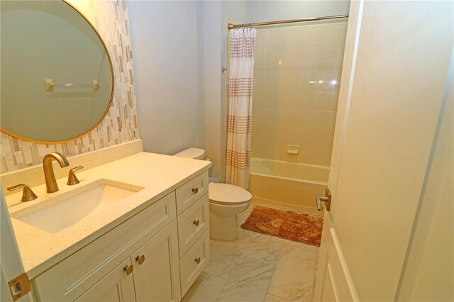 full bathroom with vanity, toilet, and shower / tub combo