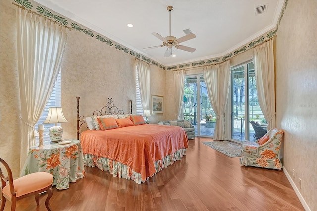 bedroom with access to outside, crown molding, ceiling fan, and hardwood / wood-style flooring