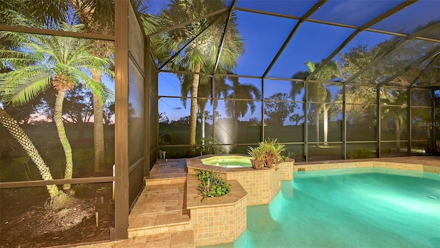 view of swimming pool featuring an in ground hot tub