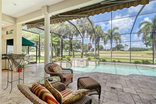 view of pool featuring outdoor lounge area, an in ground hot tub, a patio area, and a lanai