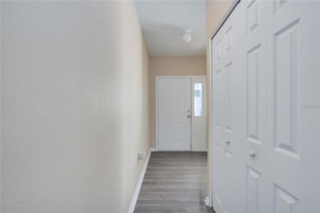 doorway featuring hardwood / wood-style floors