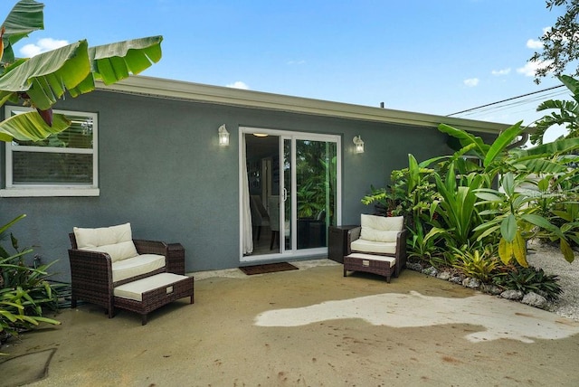 back of house with a patio area