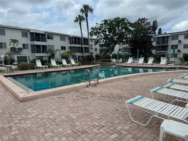 view of pool featuring a patio