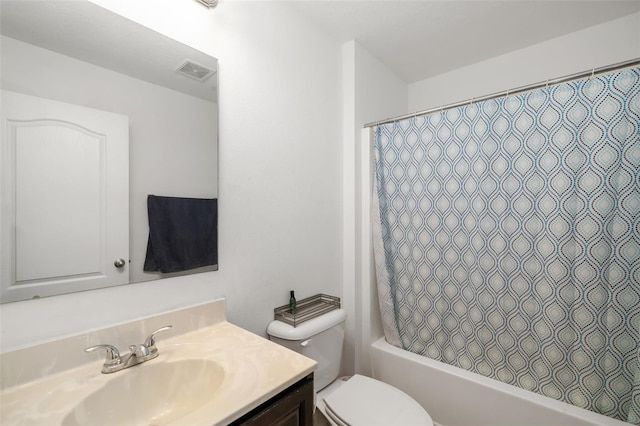 full bathroom with shower / bathtub combination with curtain, toilet, and vanity