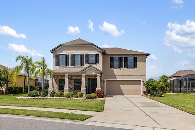 view of front of house with a garage and a front yard