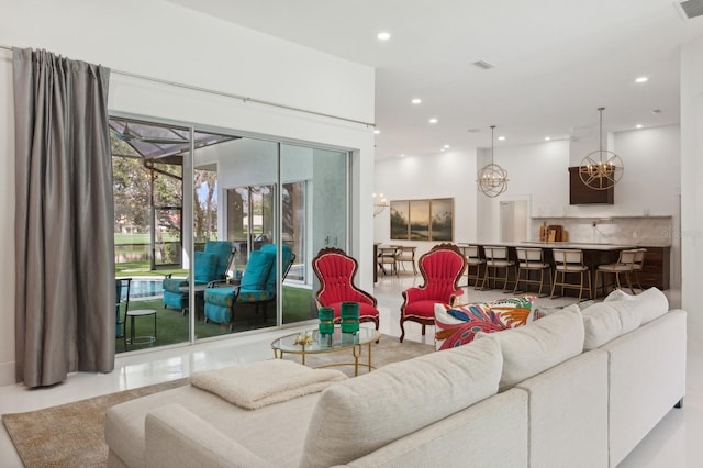 living room with an inviting chandelier