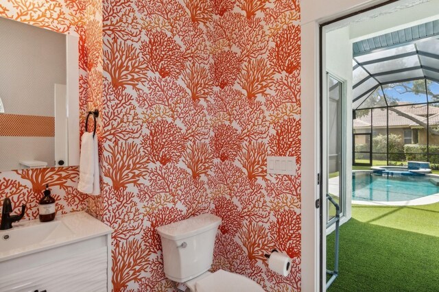 bathroom with vanity and toilet