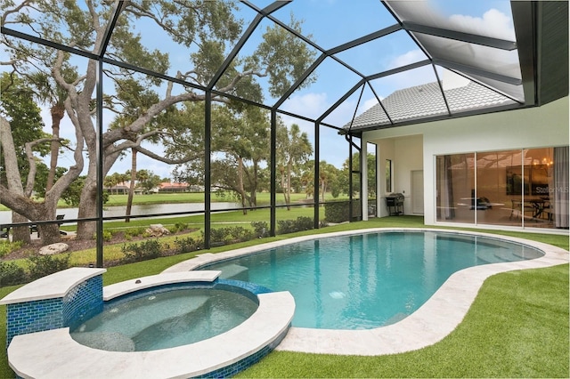 view of pool with glass enclosure, an in ground hot tub, a yard, and a water view