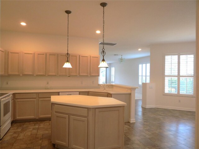 kitchen featuring pendant lighting, a kitchen island, sink, kitchen peninsula, and white electric range oven