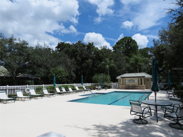 view of pool with a patio