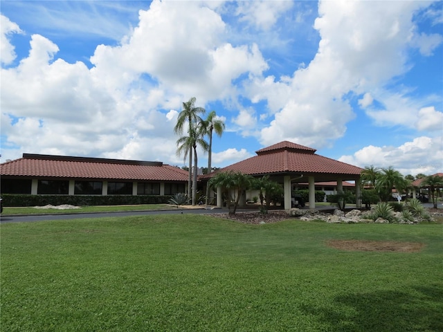 view of home's community with a yard and a gazebo