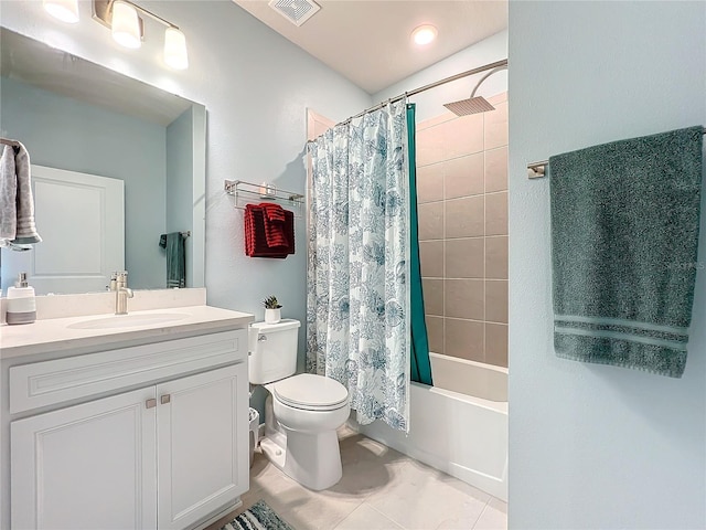 full bathroom featuring vanity, toilet, tile patterned floors, and shower / bath combination with curtain