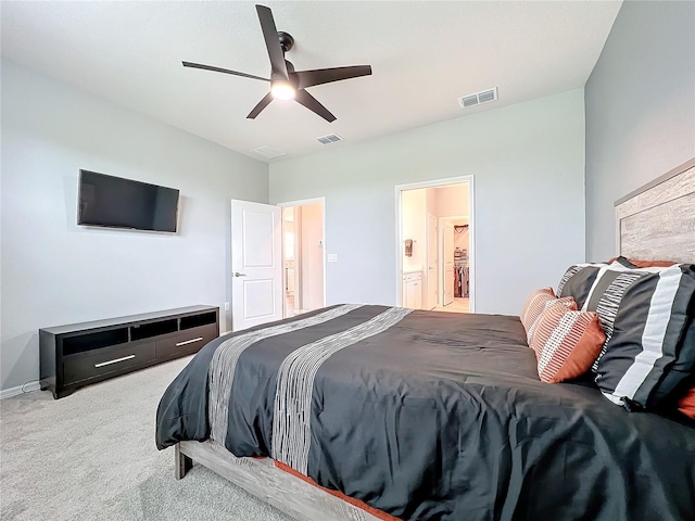 bedroom featuring light carpet and ceiling fan