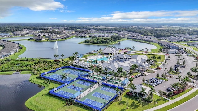 drone / aerial view with a water view