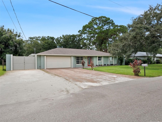 single story home featuring a front lawn