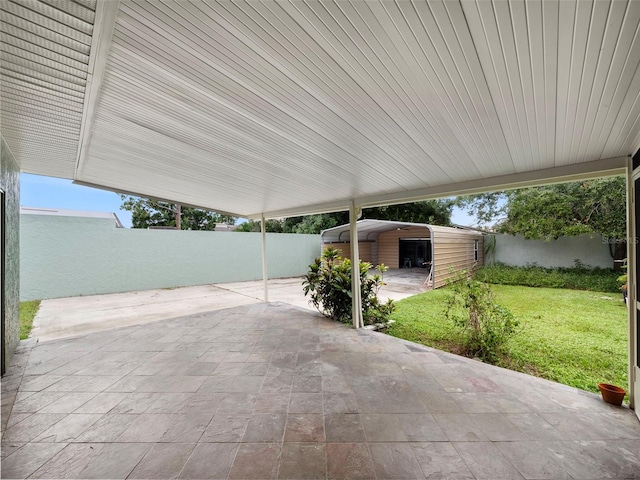 view of patio / terrace with a carport