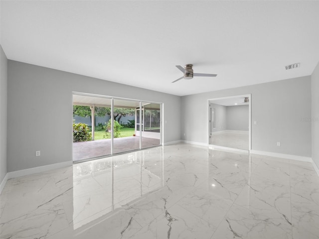 unfurnished room featuring ceiling fan