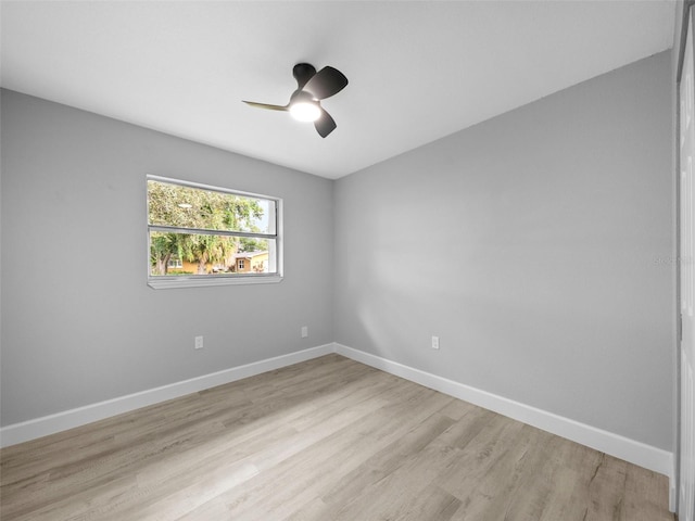 unfurnished room with ceiling fan and light hardwood / wood-style floors