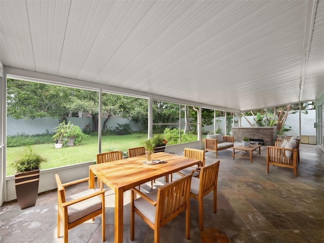 sunroom / solarium featuring plenty of natural light