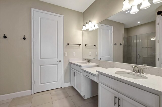 bathroom with vanity, tile patterned floors, and an enclosed shower