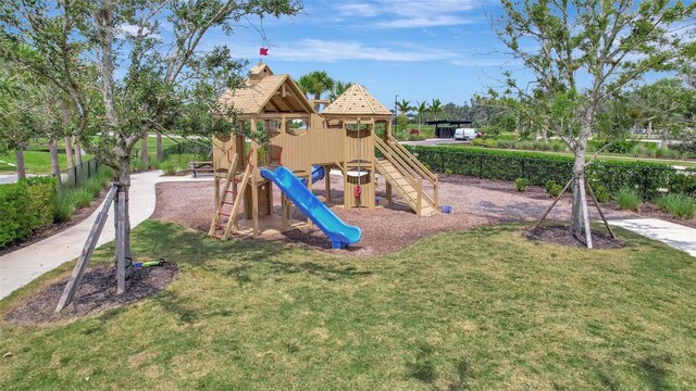 view of playground featuring a yard