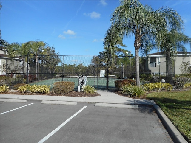 exterior space featuring tennis court