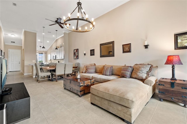 living room featuring high vaulted ceiling, ceiling fan with notable chandelier, ornamental molding, and light tile patterned flooring