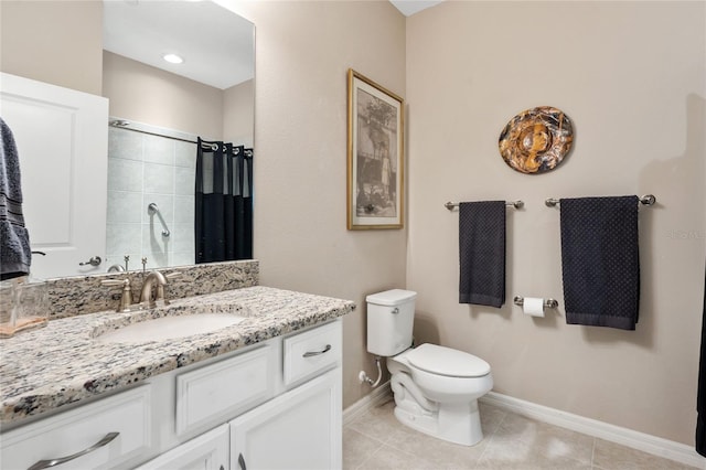 bathroom featuring tile patterned flooring, toilet, walk in shower, and vanity