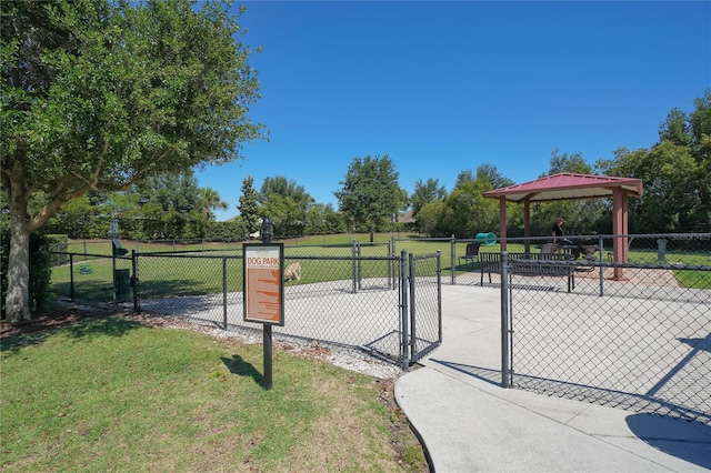 surrounding community with a lawn and a gazebo