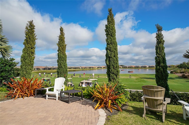 view of patio featuring a water view