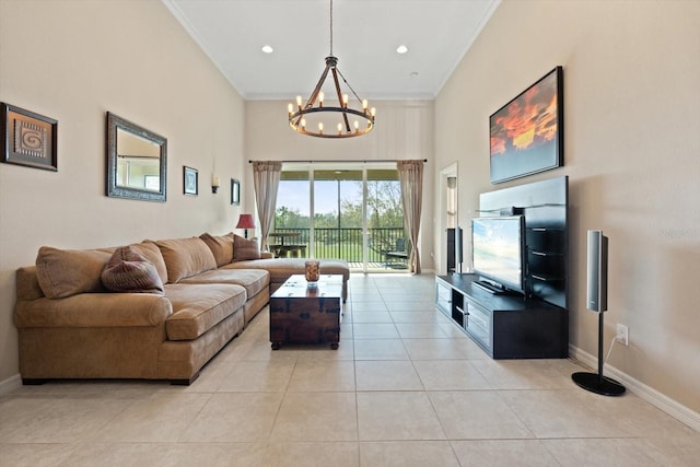 living room featuring light tile patterned floors, a high ceiling, crown molding, and baseboards