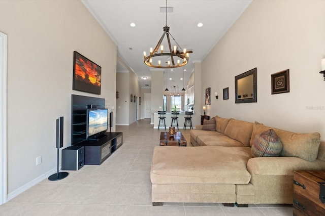 tiled living area featuring baseboards, visible vents, crown molding, a notable chandelier, and recessed lighting